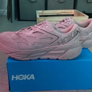 Pink HOKA tennis shoes